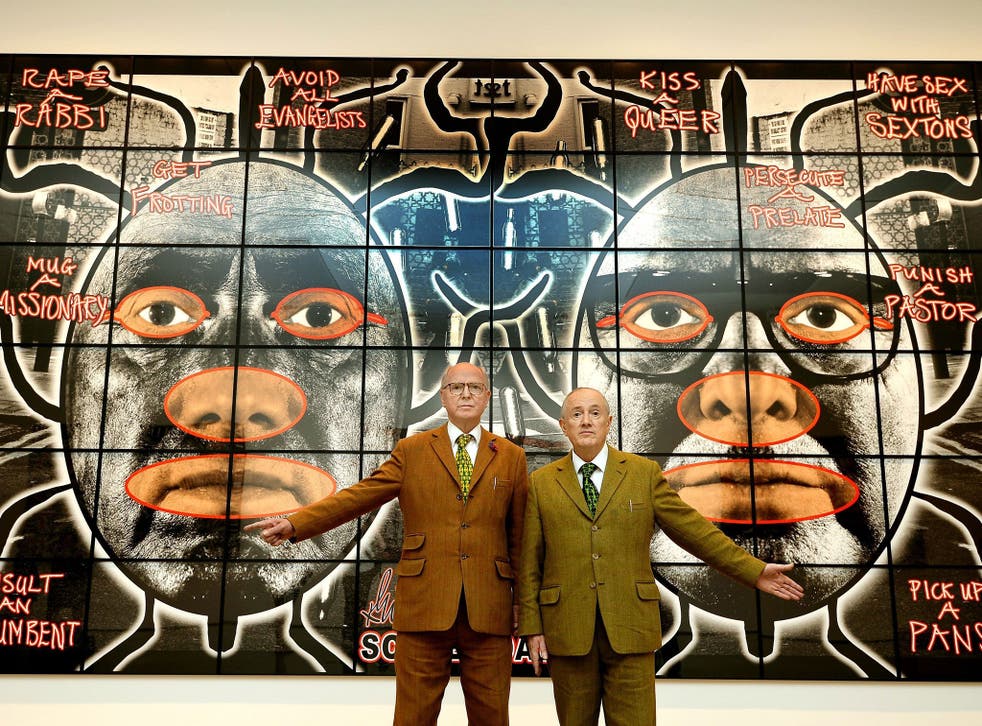 Gilbert and George in front of one of their new artworks,
‘10’