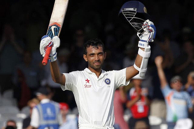 Ajinkya Rahane acknowledges the applause of the crowd after completing his century