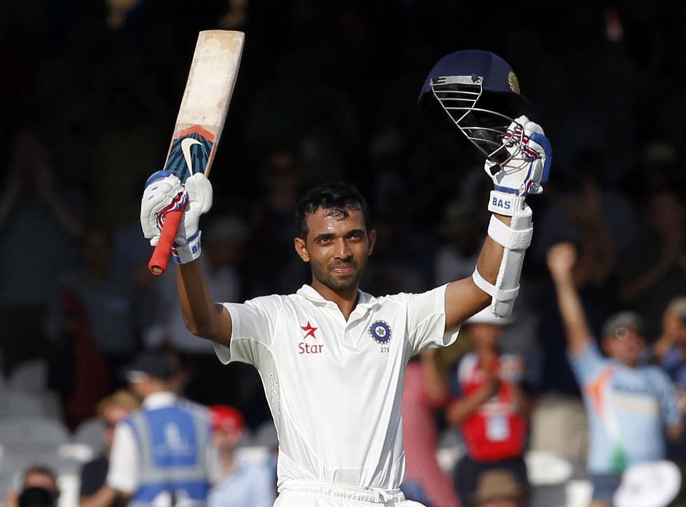 Ajinkya Rahane acknowledges the applause of the crowd after completing his century