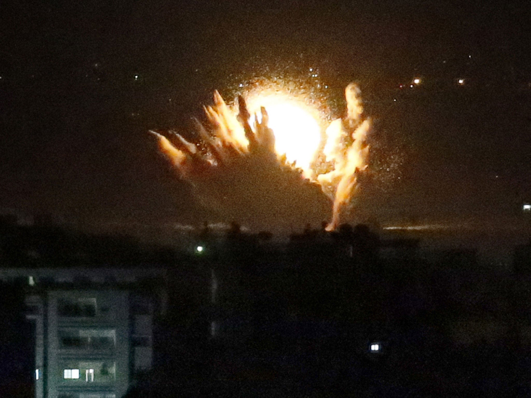 An Israeli missile strikes in Gaza City