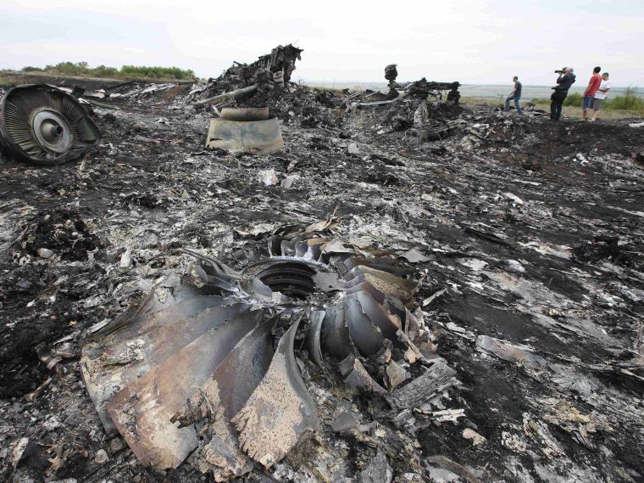 Debris is seen at the site of Thursday's Malaysia Airlines Boeing 777 plane crash near the settlement of Grabovo, in the Donetsk region July 18, 2014.