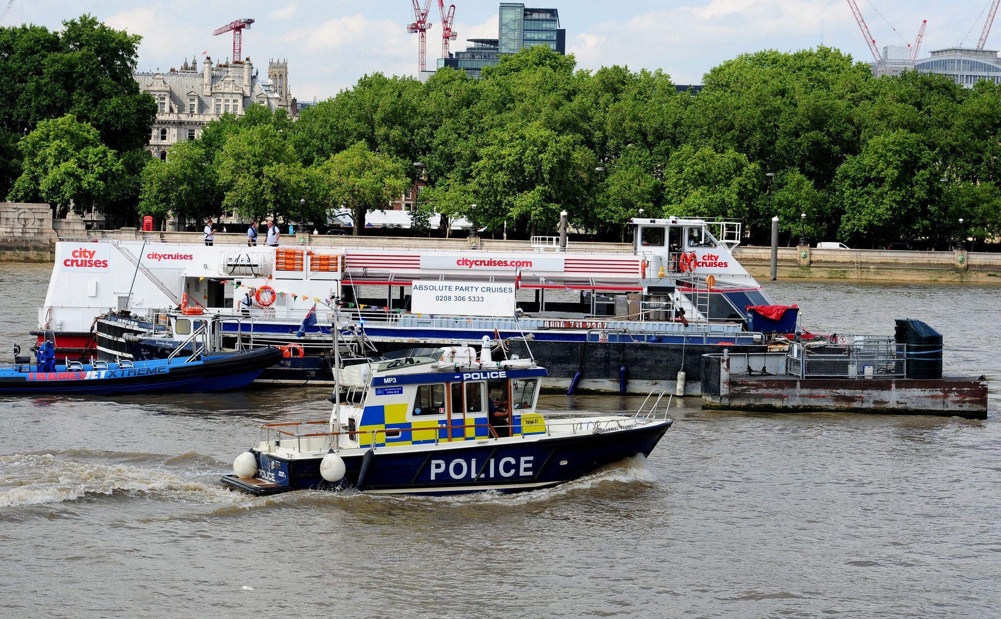 A tourist ferry has crashed into a cargo vessel on the Thames