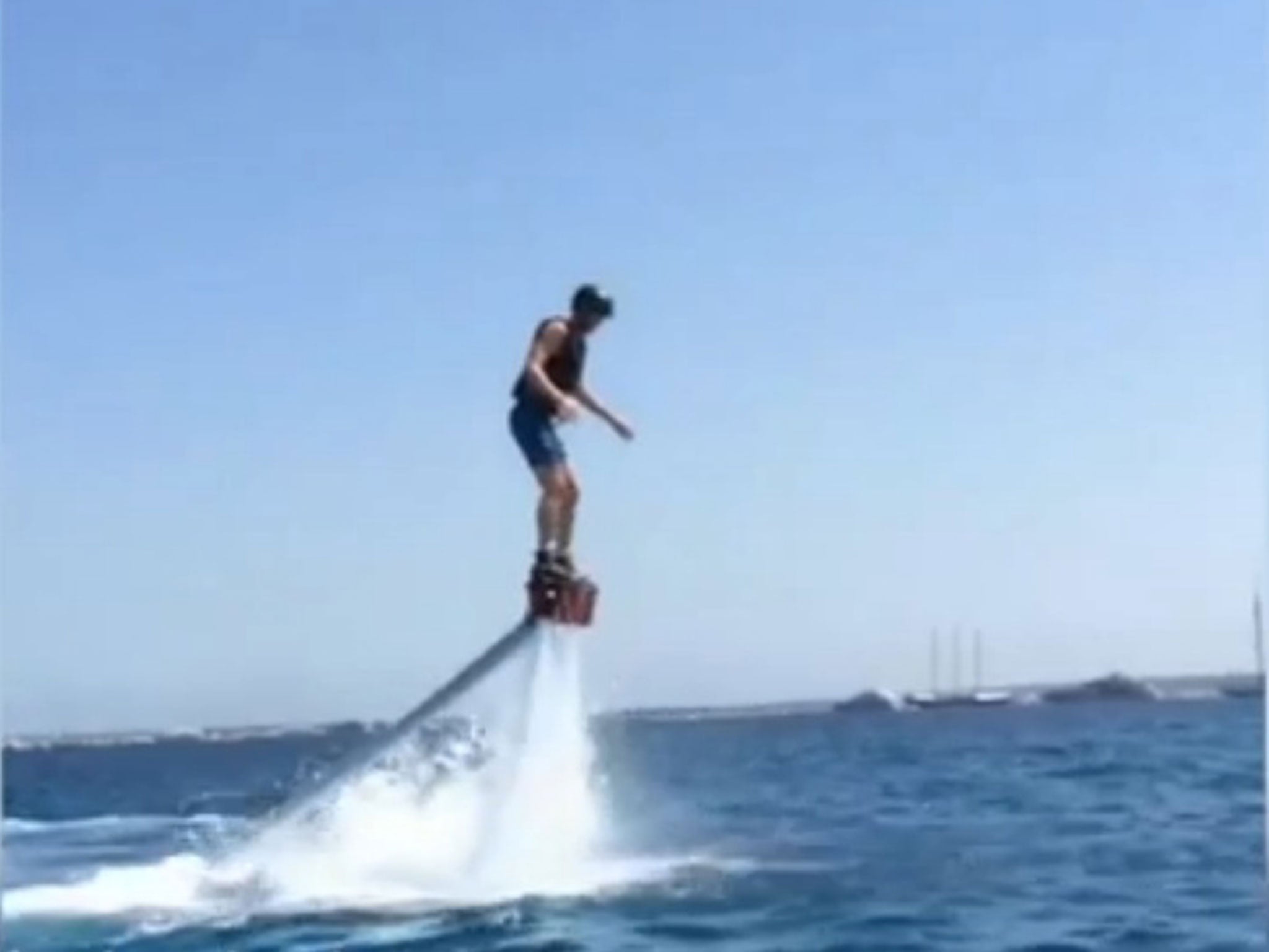 Andre Schurrle enjoys a water jet-pack while on a post-World Cup holiday