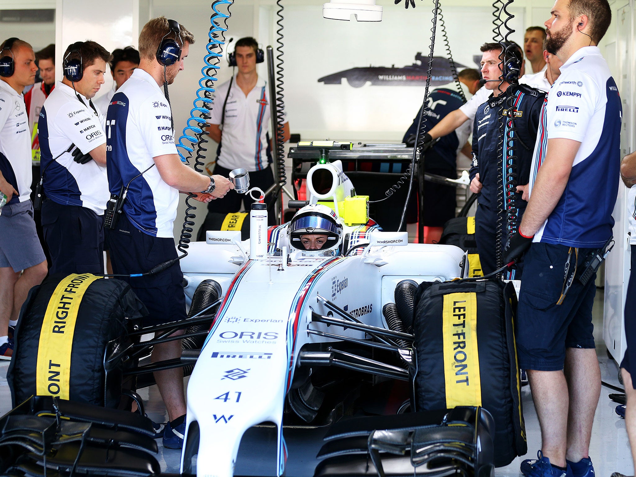 Susie Wolff takes part in Friday practice at the German Grand Prix