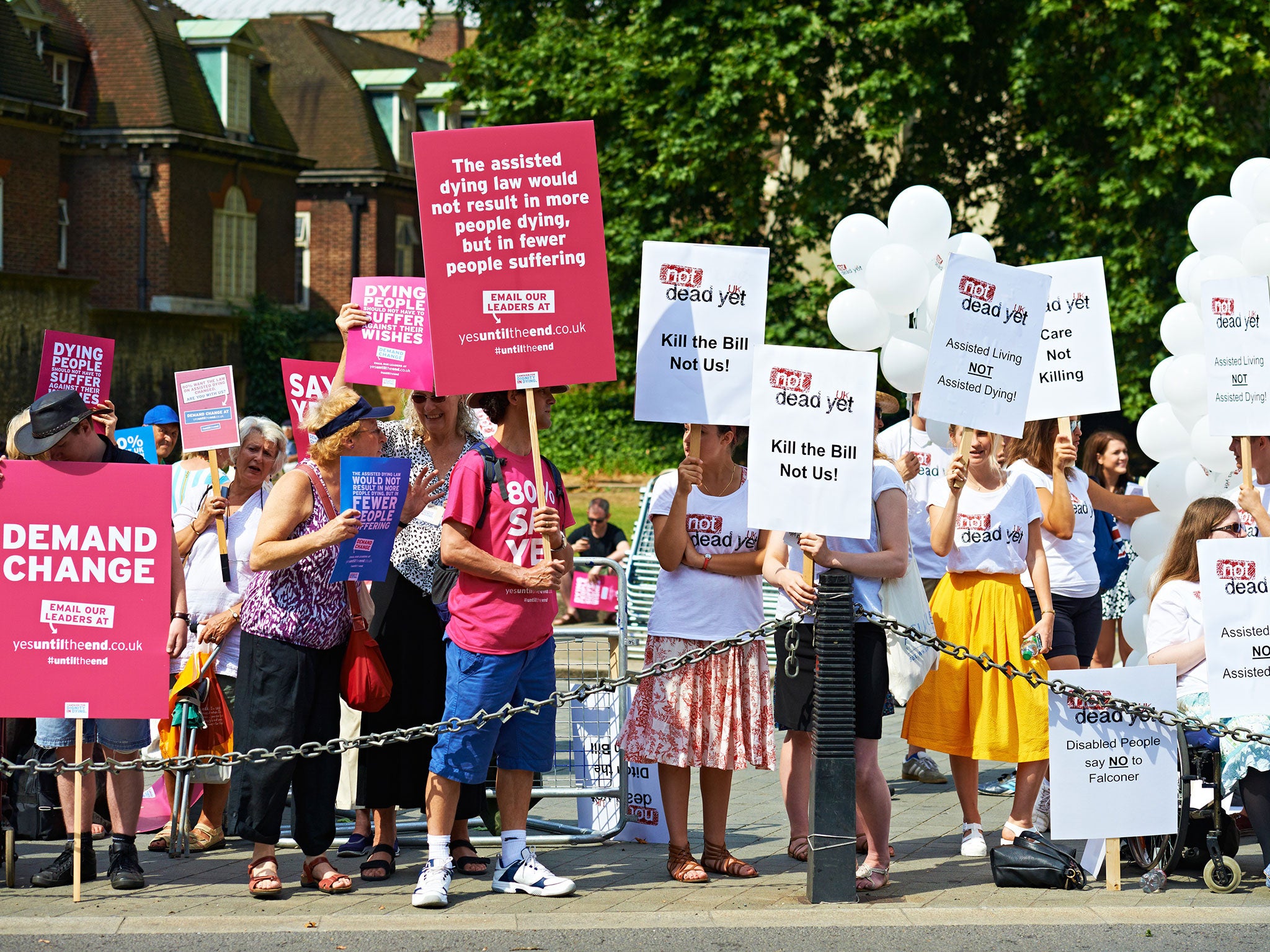 Supporters of Dignity in Dying and Not Dead Yet outside the House of Lords yesterday