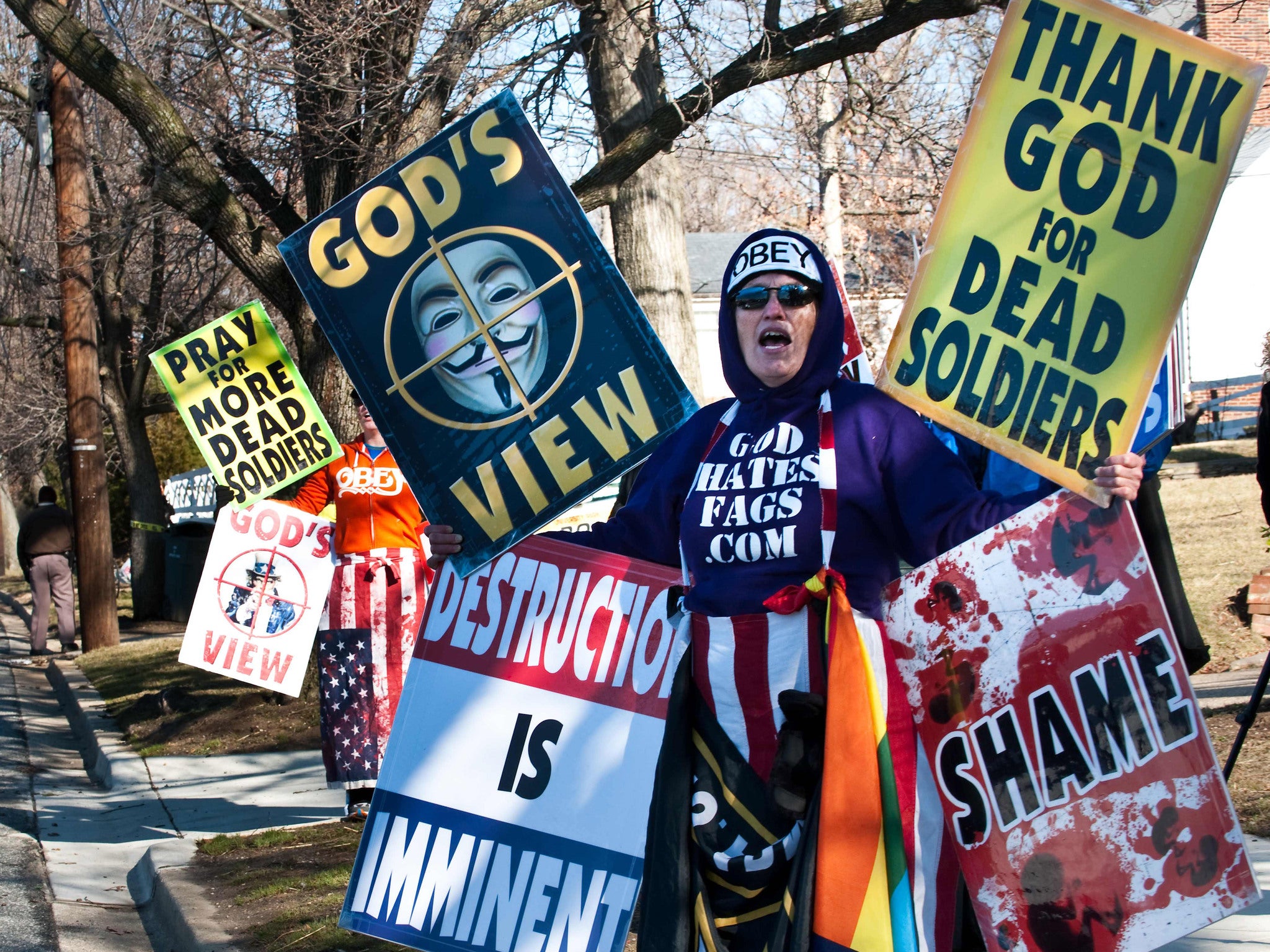 Shirley Phelps-Roper of the Westboro Baptist Church, Kansas, stages a protest across the street from a high school near Washington