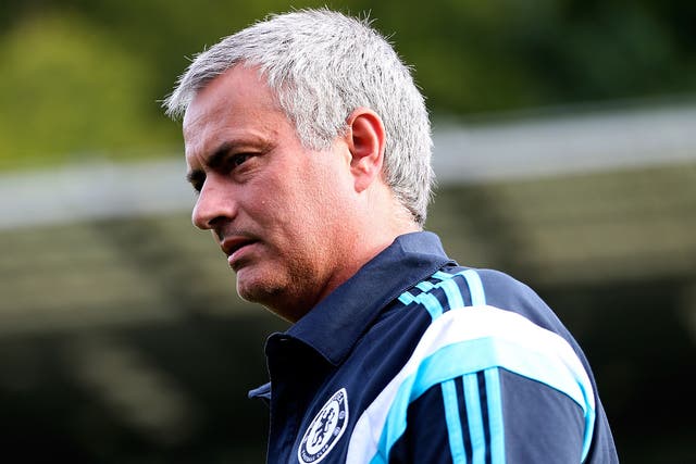 Jose Mourinho watches his Chelsea team in pre-season action against Wycombe