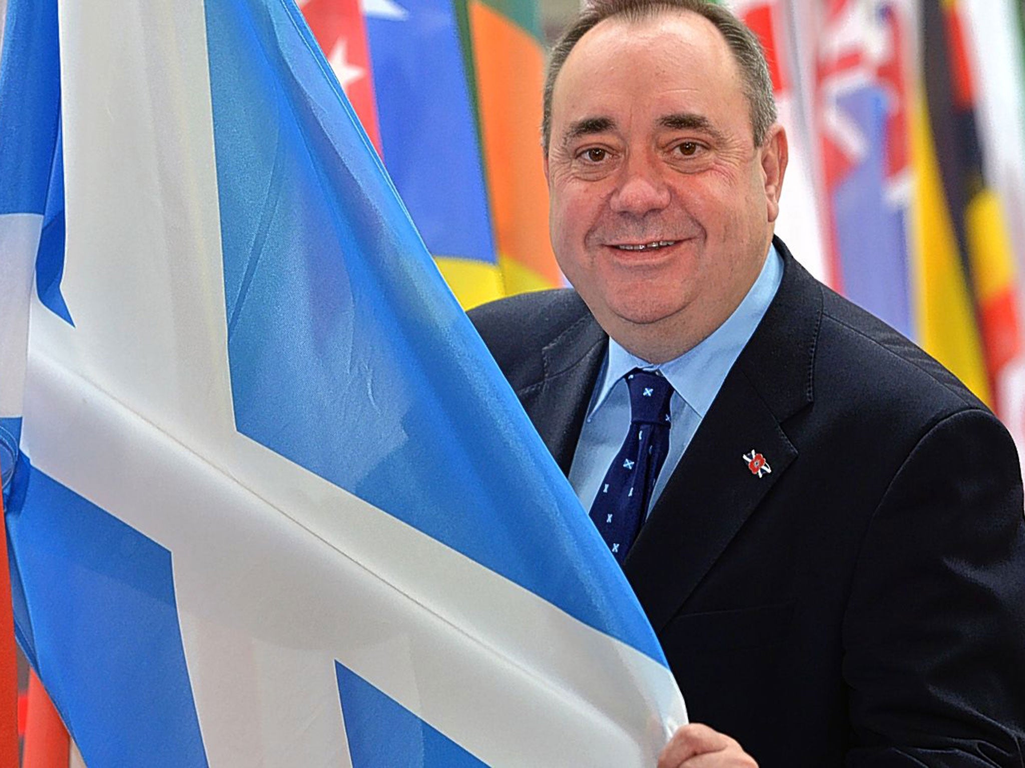 Flag bearer Alex Salmond finds a Scottish flag among all those of the Commonwealth