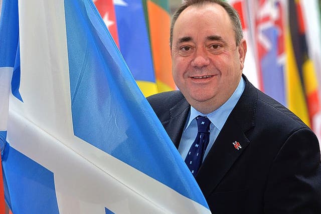 Flag bearer Alex Salmond finds a Scottish flag among all those of the Commonwealth 