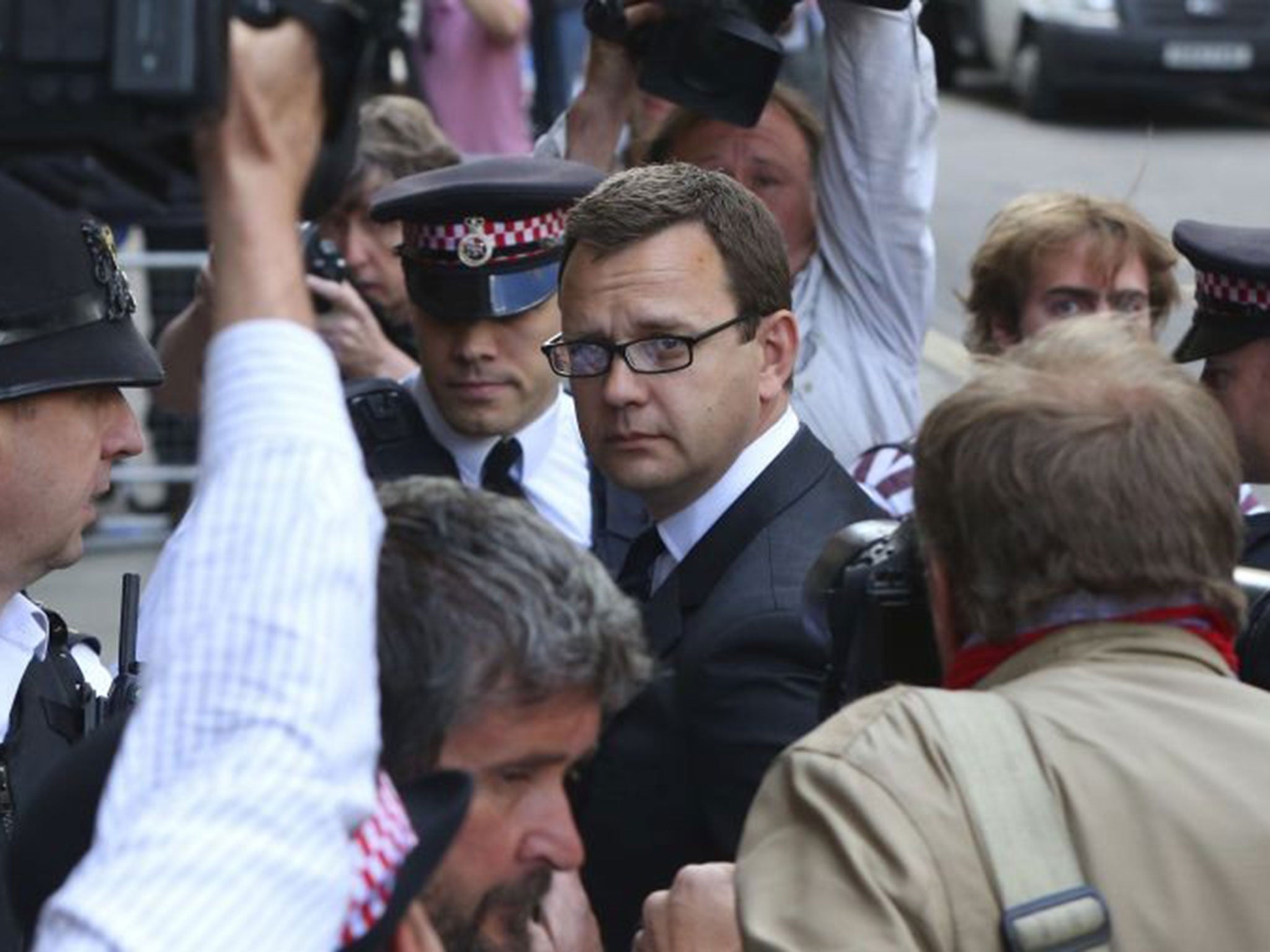 Andy Coulson is accused of lying under oath, which he deniea