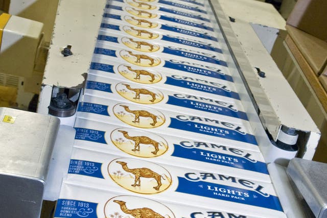 Cartons of Camel cigarettes come off the assembly line at an R.J. Reynolds plant