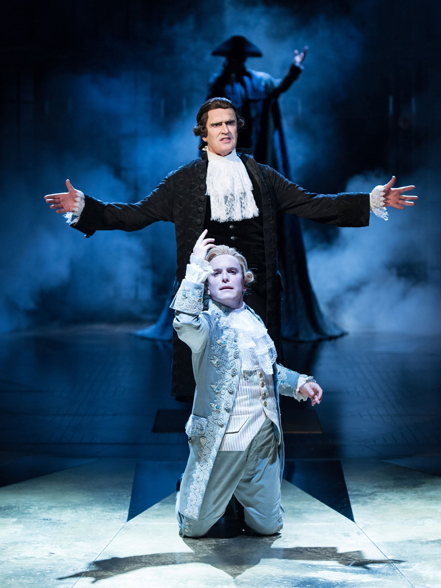 Rupert Everett as Salieri, back, and Joshua McGuire as Mozart in Jonathan Church’s production of ‘Amadeus’