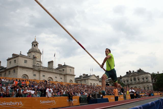 France’s Renaud Lavillenie on his way to winning the men’s pole vault, during the Anniversary Games at Horse Guards Parade