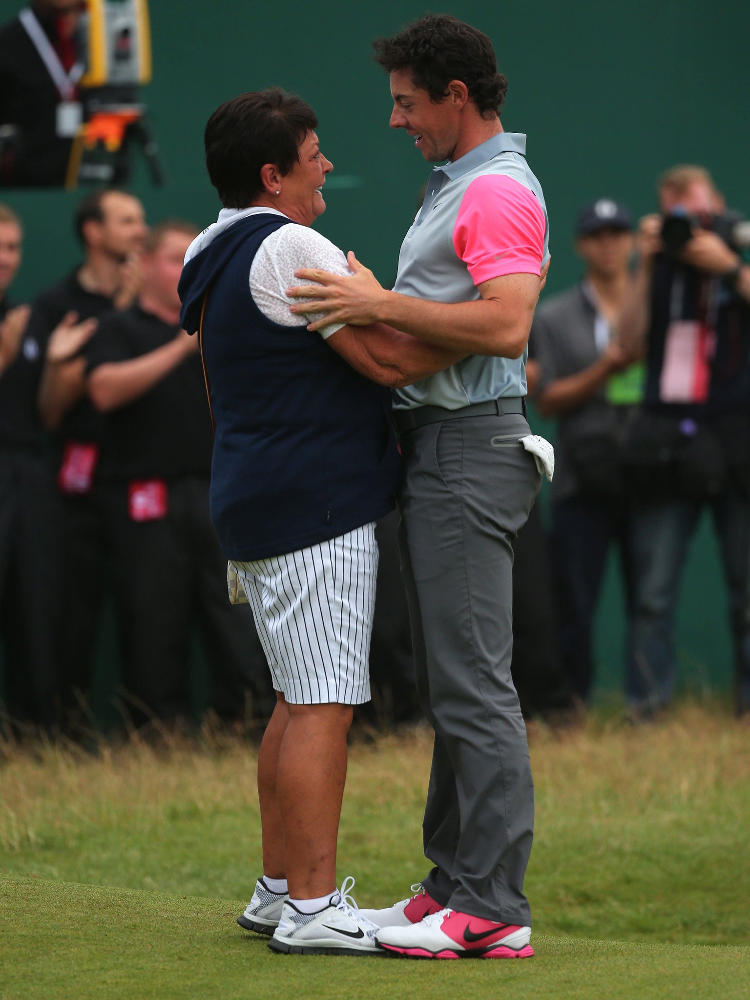 Rory McIlroy is congratulated by his mother, Rose, on the 18th green. ‘I was trying not to cry,’ he said