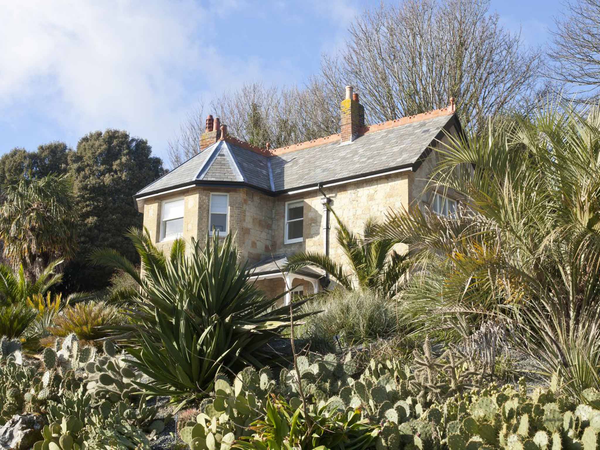 Gardening leave: Signal Point Cottage sits in the Arid Garden