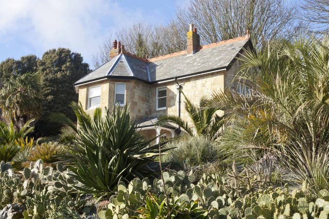 Gardening leave: Signal Point Cottage sits in the Arid Garden