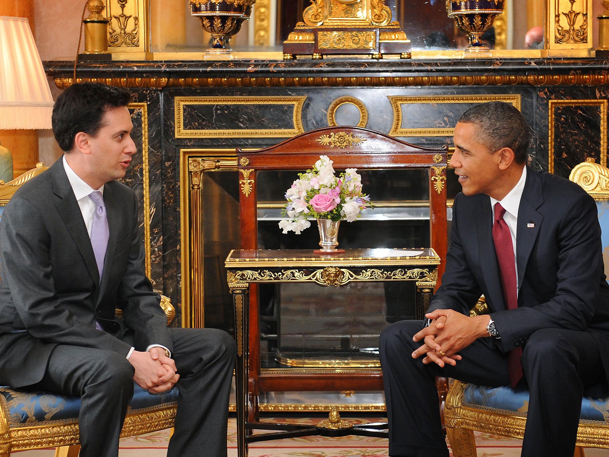 US President Barack Obama, right, meeting with Ed Miliband at Buckingham Palace in London