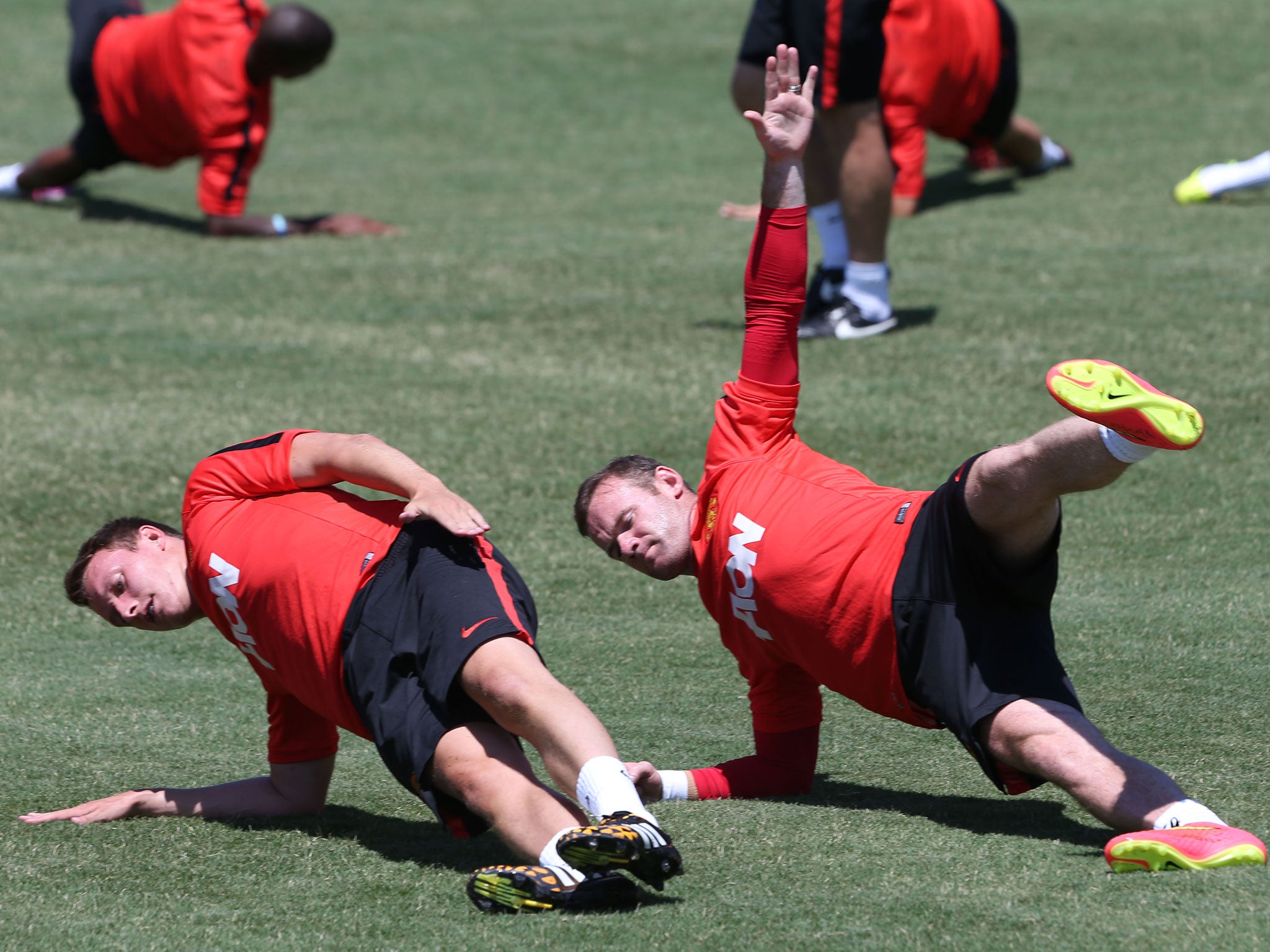Wayne Rooney trains alongside the rest of the Manchester United squad in the United States