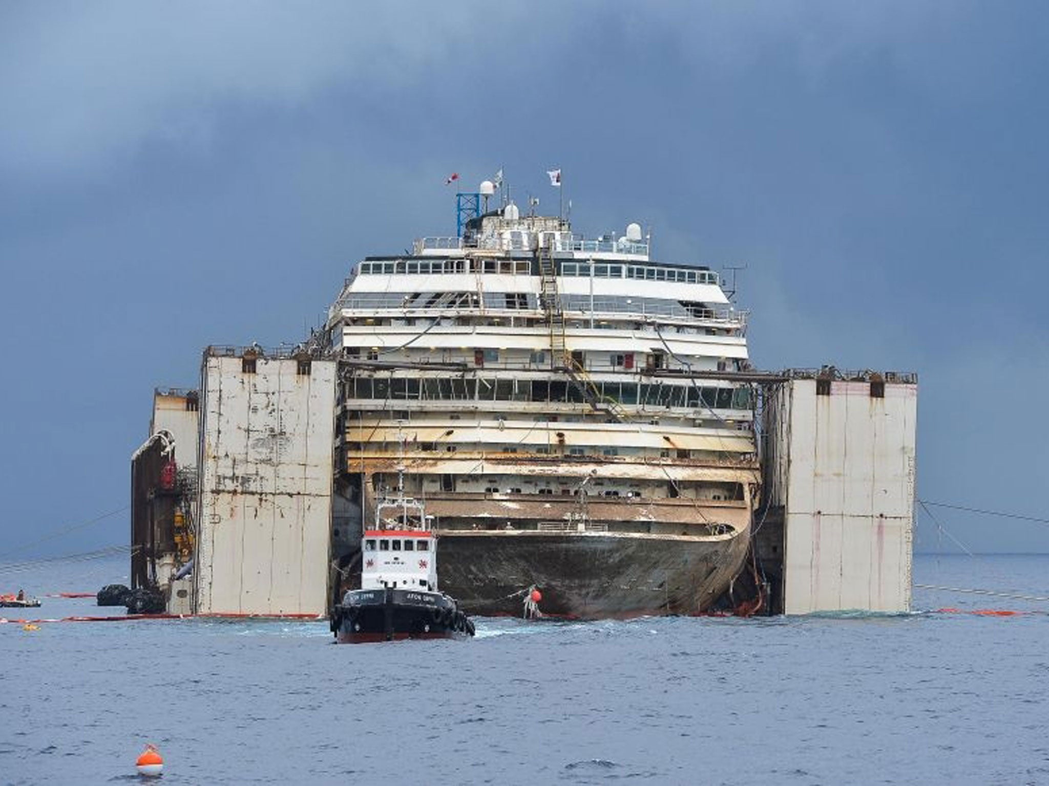 The Costa Concordia cruise ship after being refloated using air tanks attached to its sides on July 22, 2014 at Giglio Island.