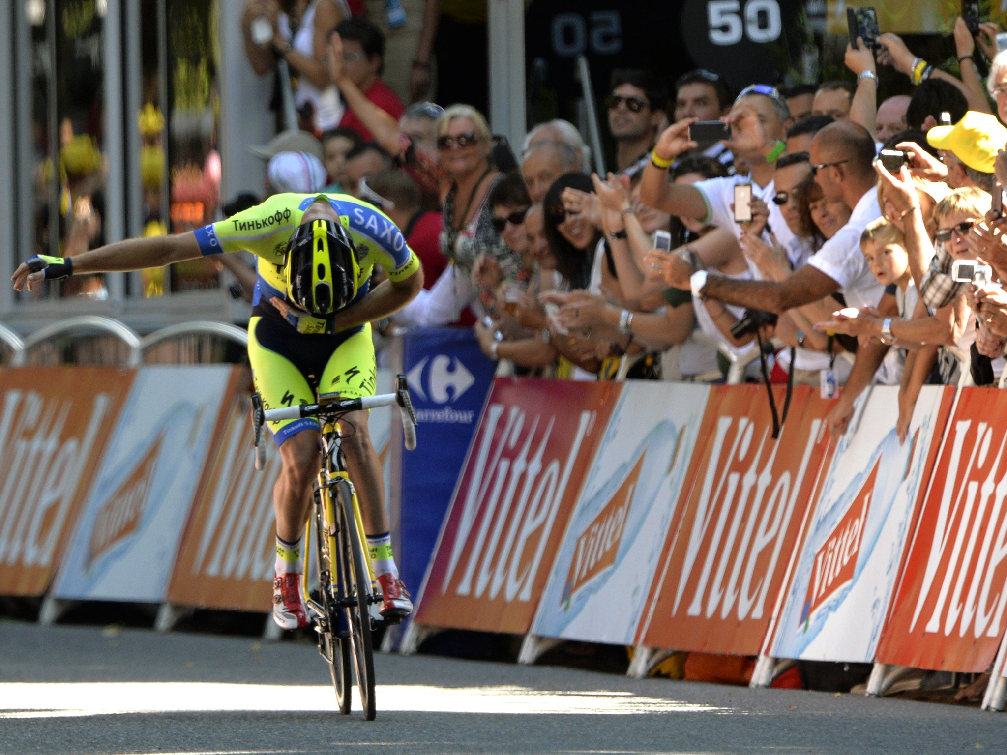 Michael Rogers takes a bow as he claims victory on stage 16 of the Tour