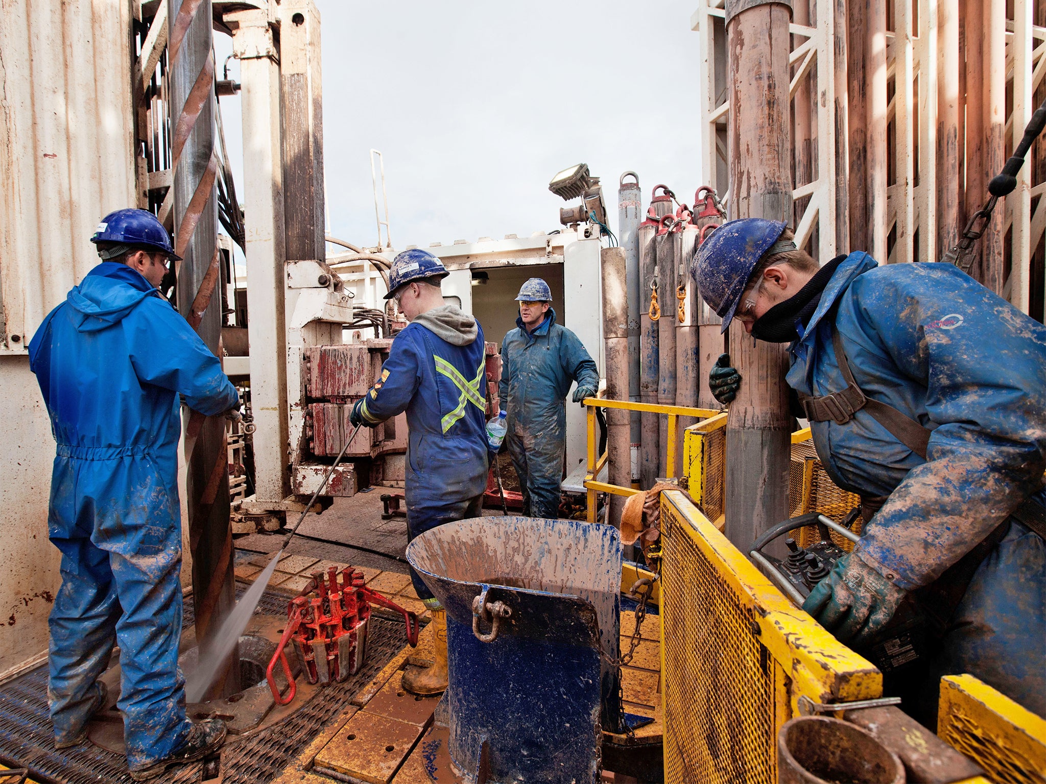 Engineers on the drilling platform of the Cuadrilla shale fracking facility in Preston (Getty)