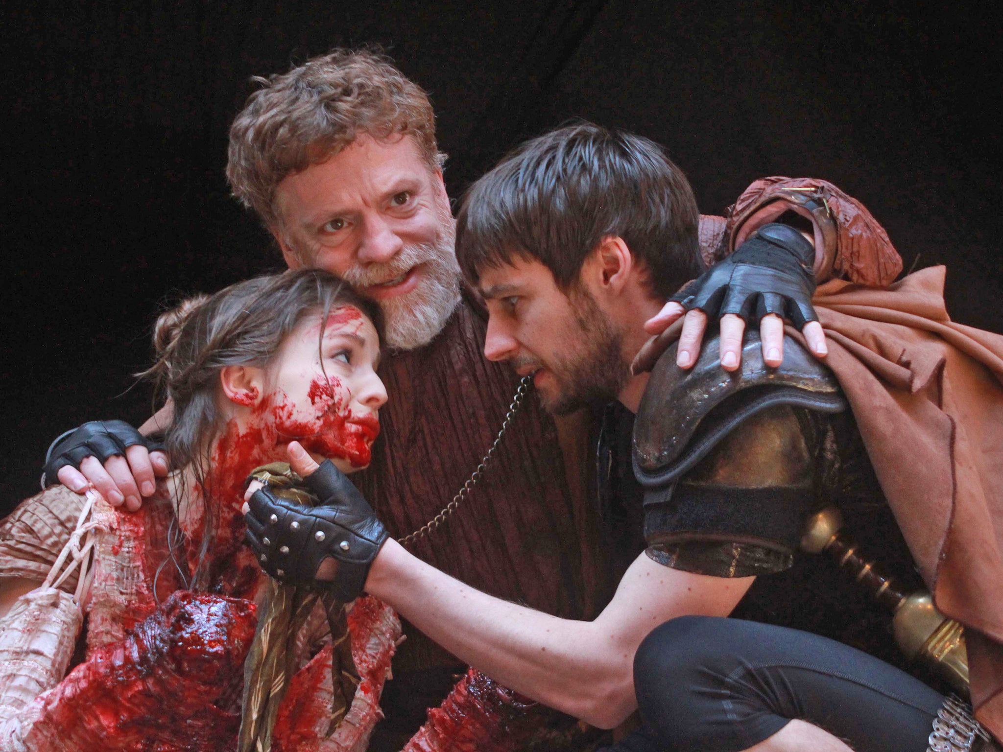 Flora Spencer-Longhurst as Lavinia, William Houston as Titus Andronicus and Dyfan Dwyfor as Lucius