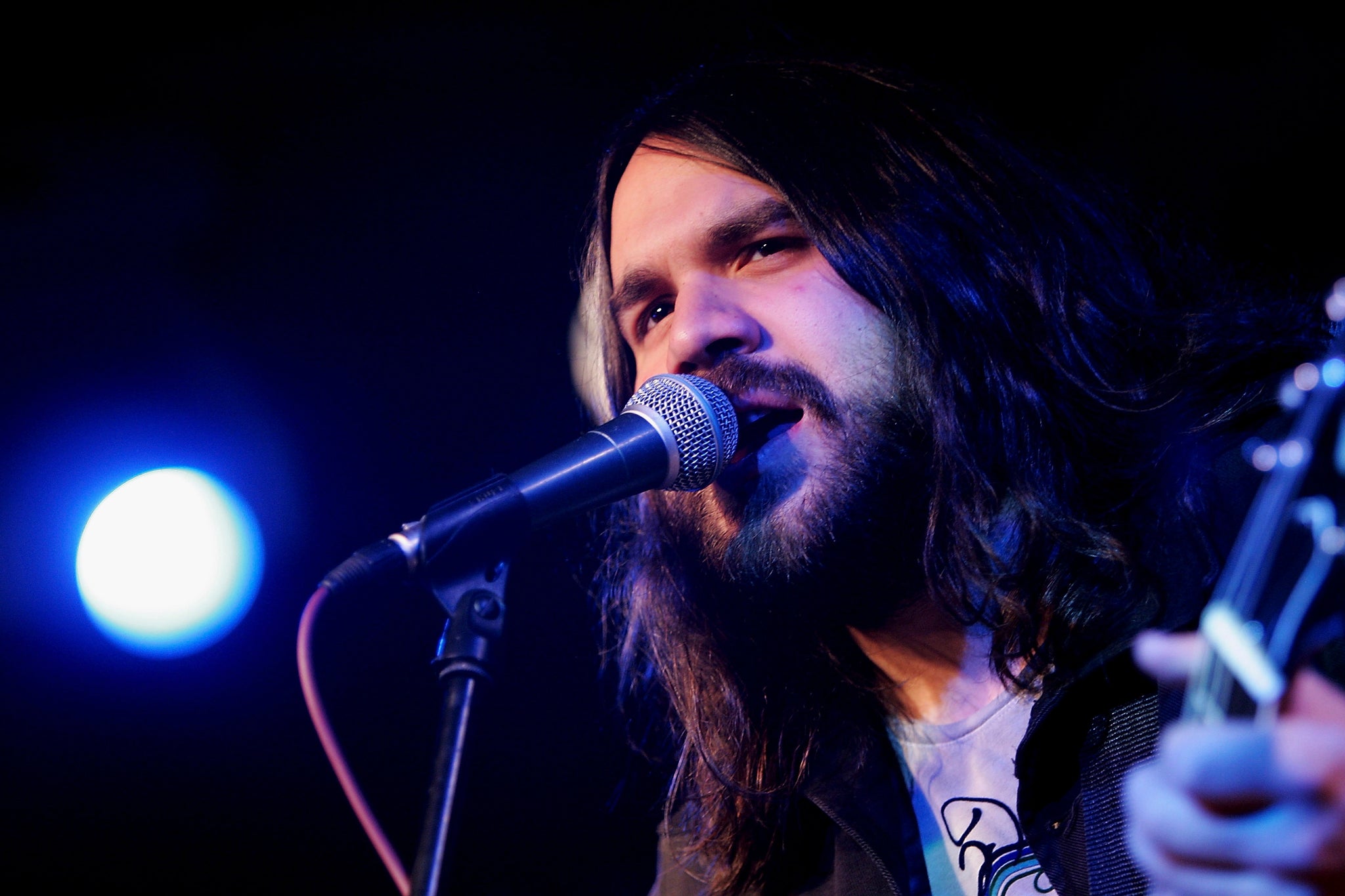 Romeo of The Magic Numbers performs on stage