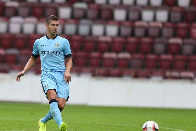 Matija Nastasic playing for Manchester City in a pre-season friendly against Hearts