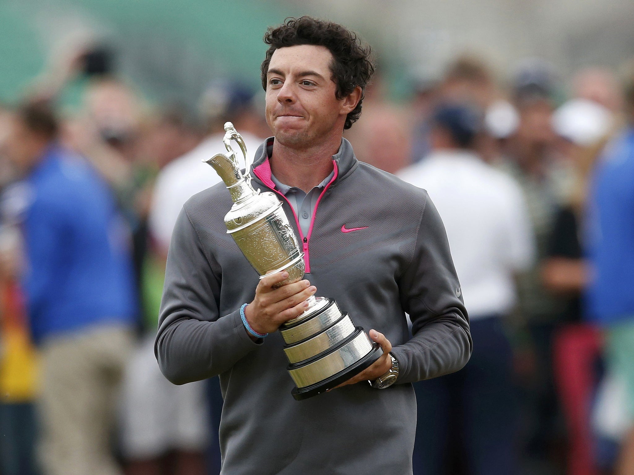 Rory McIlroy of Northern Ireland celebrates as he holds the Claret Jug after winning the British Open Championship at the Royal Liverpool Golf Club in Hoylake, northern England