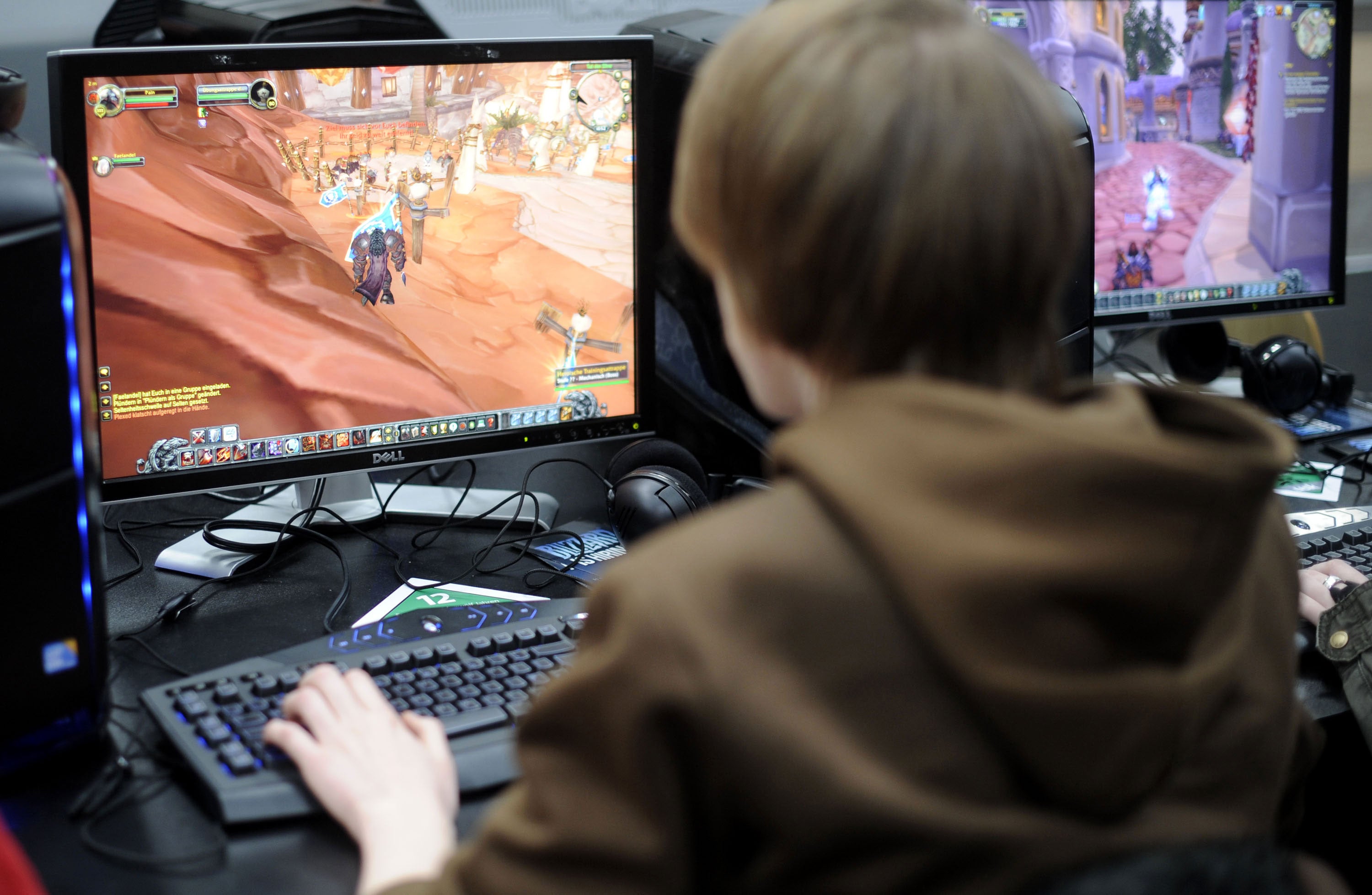 A visitor plays the computer game 'World of Warcraft' at the world's biggest high-tech fair, the CeBIT on March 4, 2010 in the northern German city of Hanover. Some 4,157 companies from 68 countries are displaying their latest gadgets at the fair taking place from March 2 to 6, 2010.