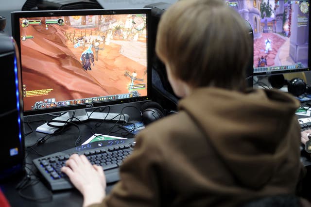 A visitor plays the computer game 'World of Warcraft' at the world's biggest high-tech fair, the CeBIT on March 4, 2010 in the northern German city of Hanover. Some 4,157 companies from 68 countries are displaying their latest gadgets at the fair taking place from March 2 to 6, 2010.