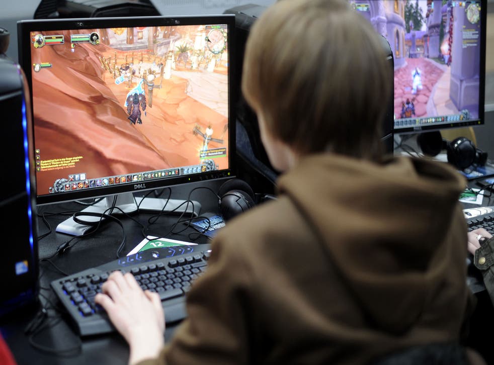 A young man plays the computer game 'World of Warcraft'