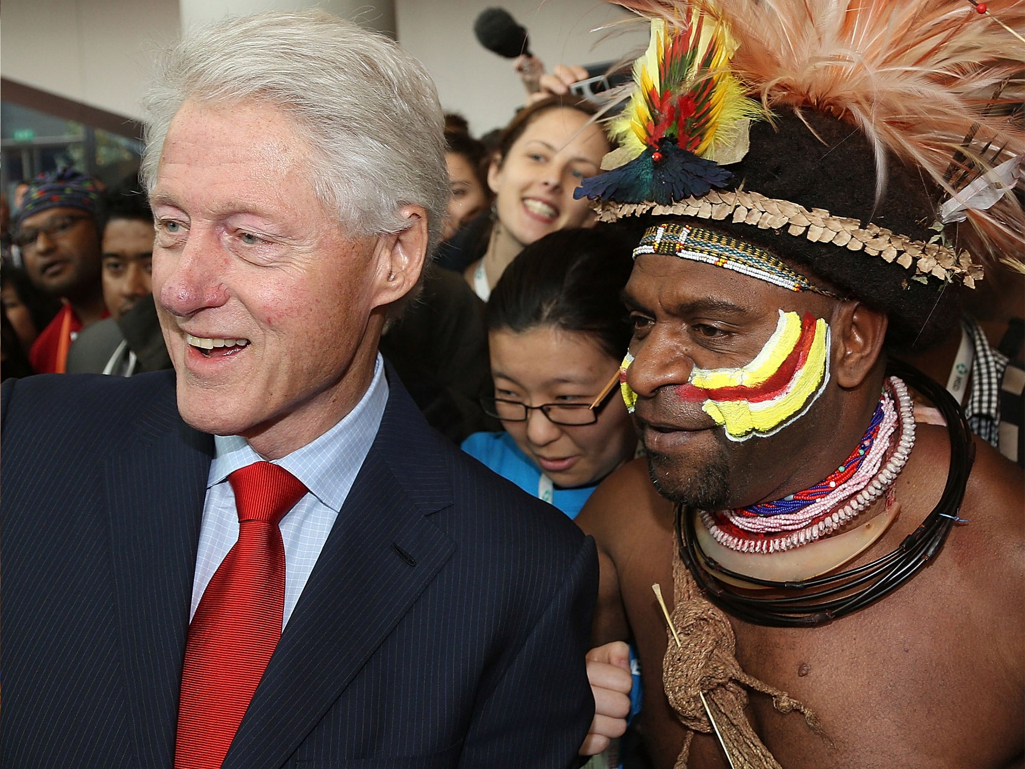 Bill Clinton greets conference attendees at the International Aids Conference in Melbourne