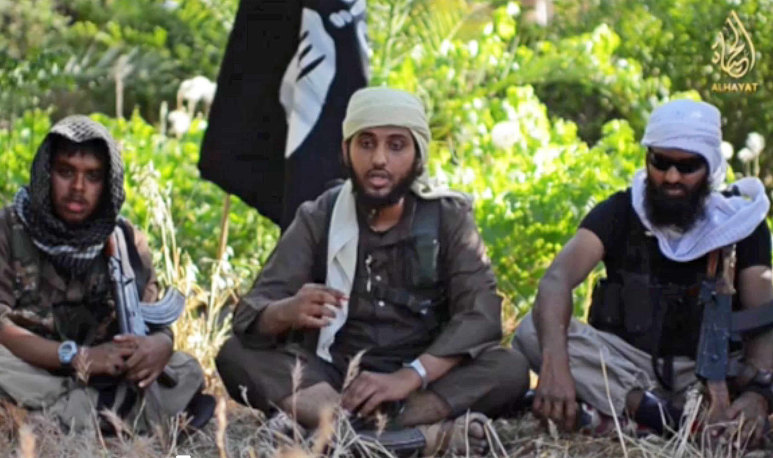 Young British men feature in an Isis video in which they urge Islamists in the West to join them in Iraq and Syria