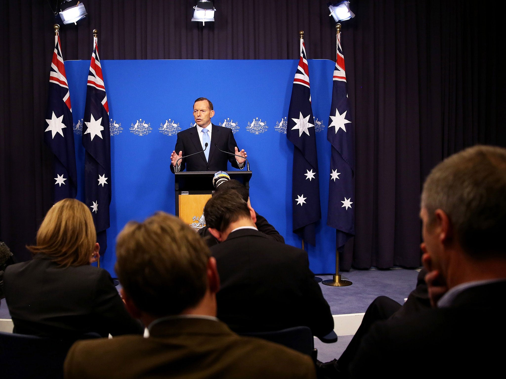 Australia Prime Minister Office on July 23, 2014 shows Prime Minister Tony Abbott speaking at a press conference in Canberra
