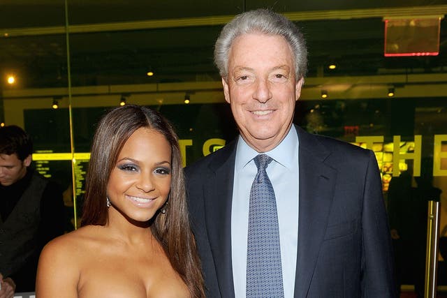 Michael Roth (pictured with pop star Christina Millian in 2011) still runs the ship at IPG