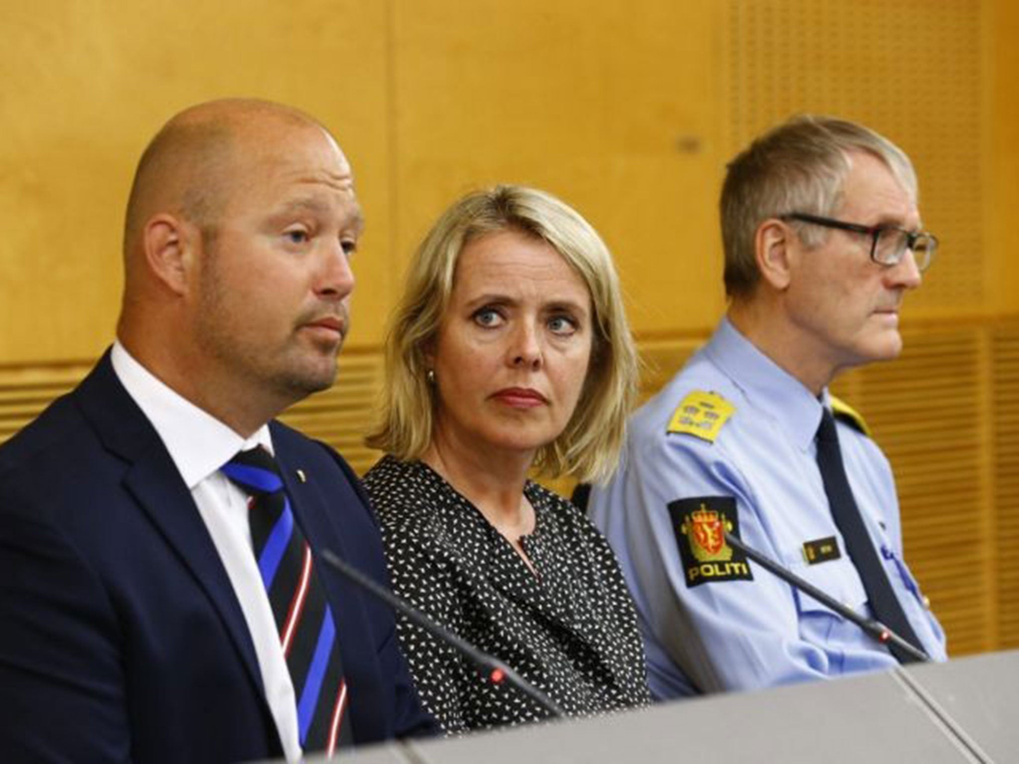 Minister of Justice and Public Security, Anders Anundsen, left, the head of the Norwegian intelligence service (PST), Benedicte Bjoernland and head of the police Vidar Refvik, right, during a press conference in Oslo on Thursday, 24 July, 2014