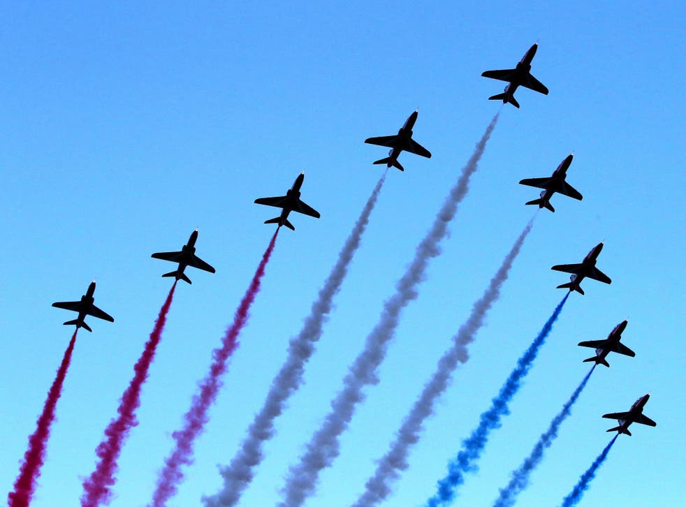 The Red Arrows fly over during the Opening Ceremony for the Glasgow 2014 Commonwealth Games at Celtic Park