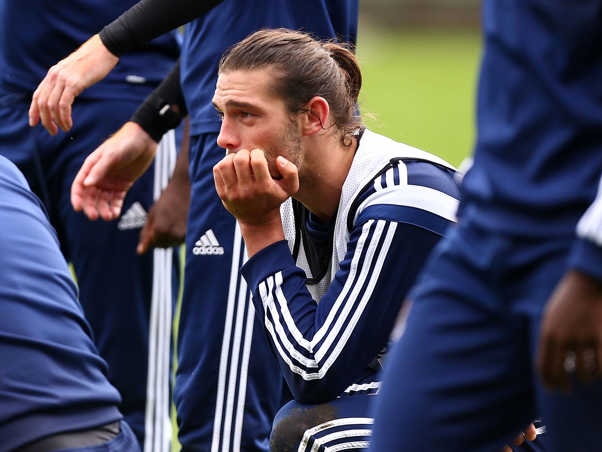Andy Carroll has suffered an ankle injury that could keep him out of action for up to 16 weeks