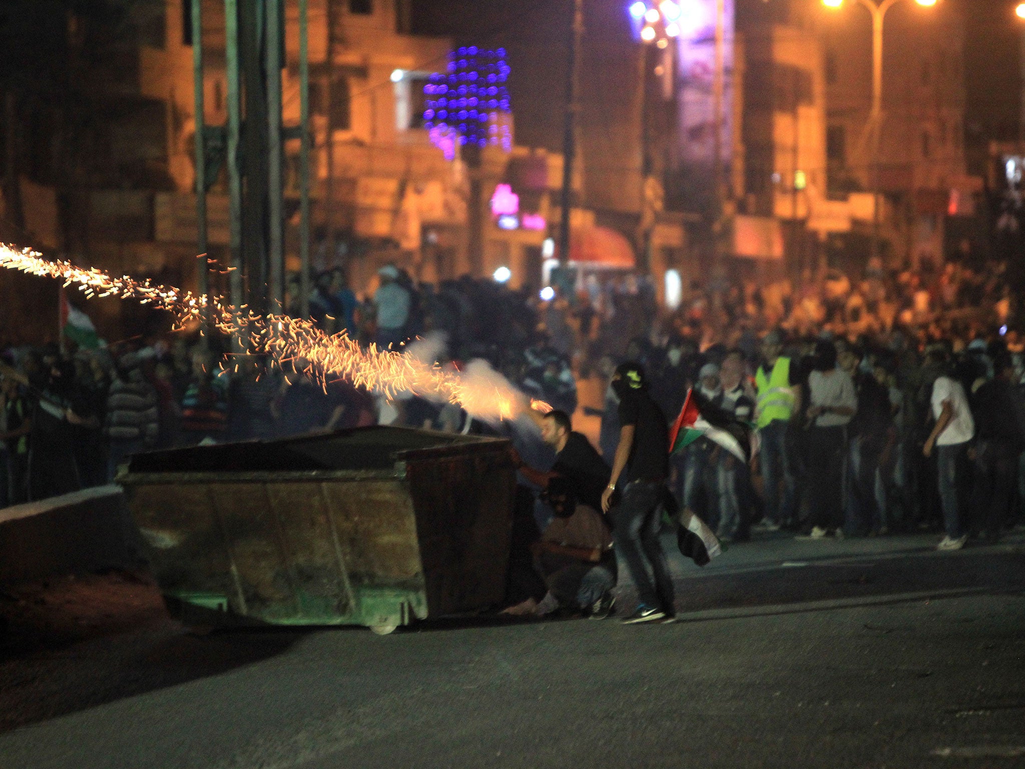 Israel reports say that protesters threw rocks and other missiles in protest