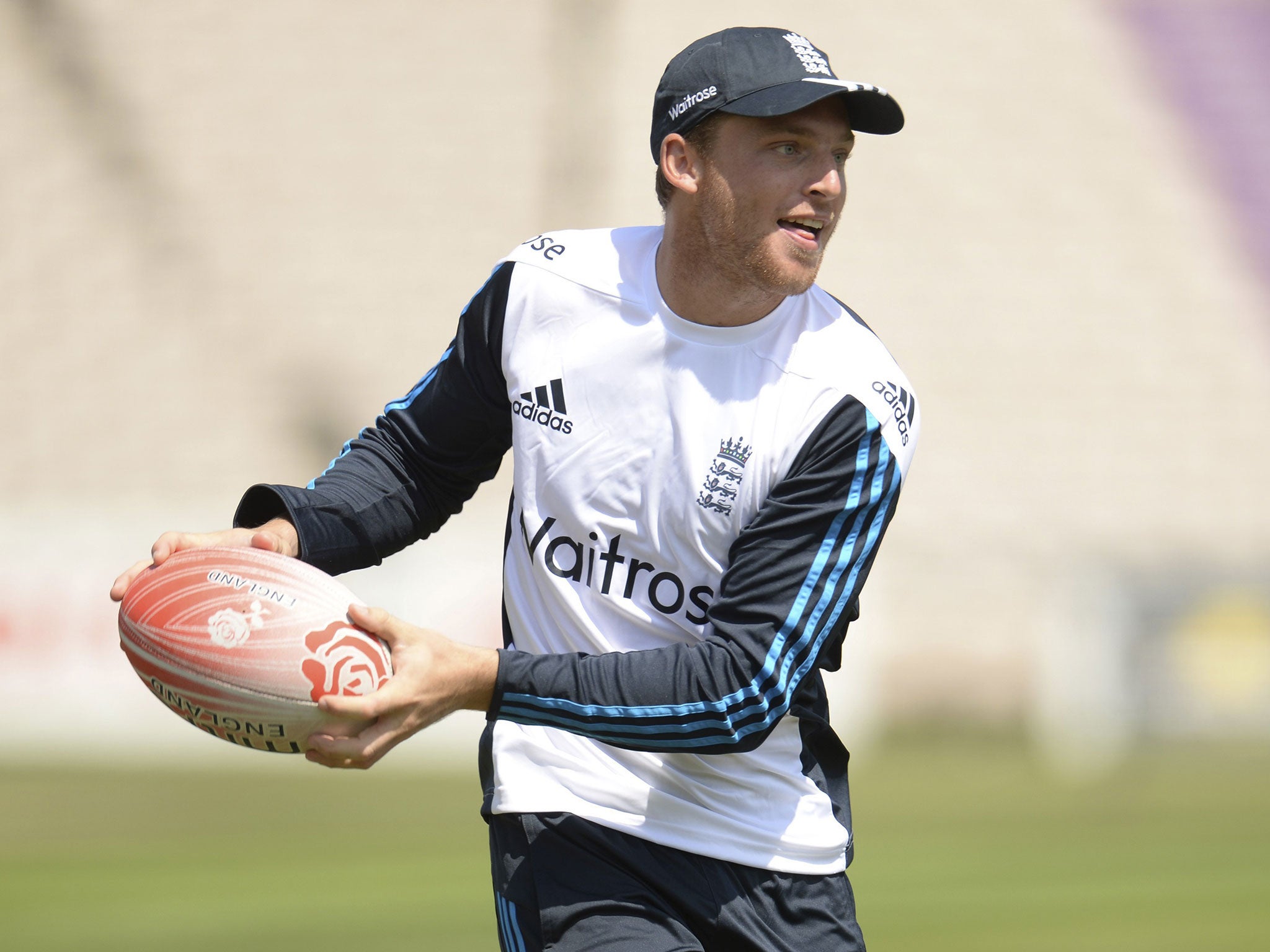 Jos Buttler plays rugby during the England cricket team’s
training
