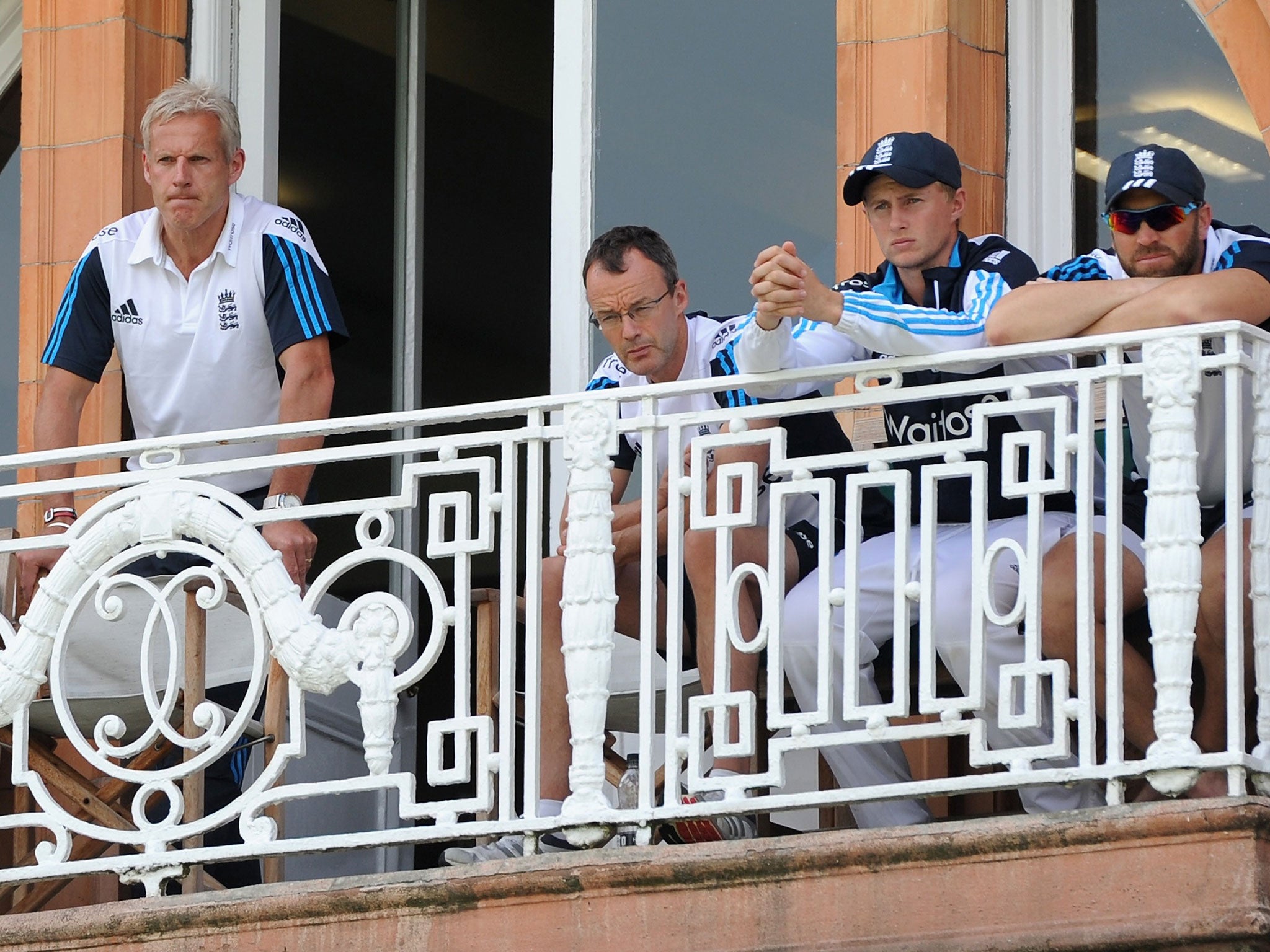 The faces of England’s players and coaches on the dressing room balcony during the second Test at Lord’s give the game away
