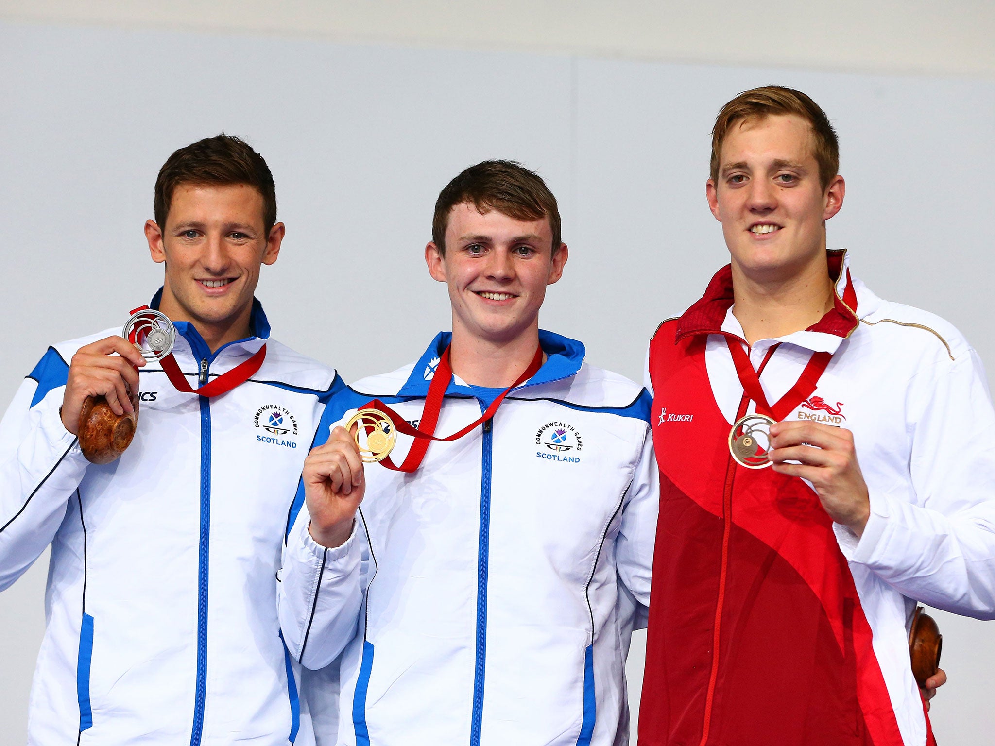 Ross Murdoch with his gold medal between Michael Jamieson (left) and Andrew Willis