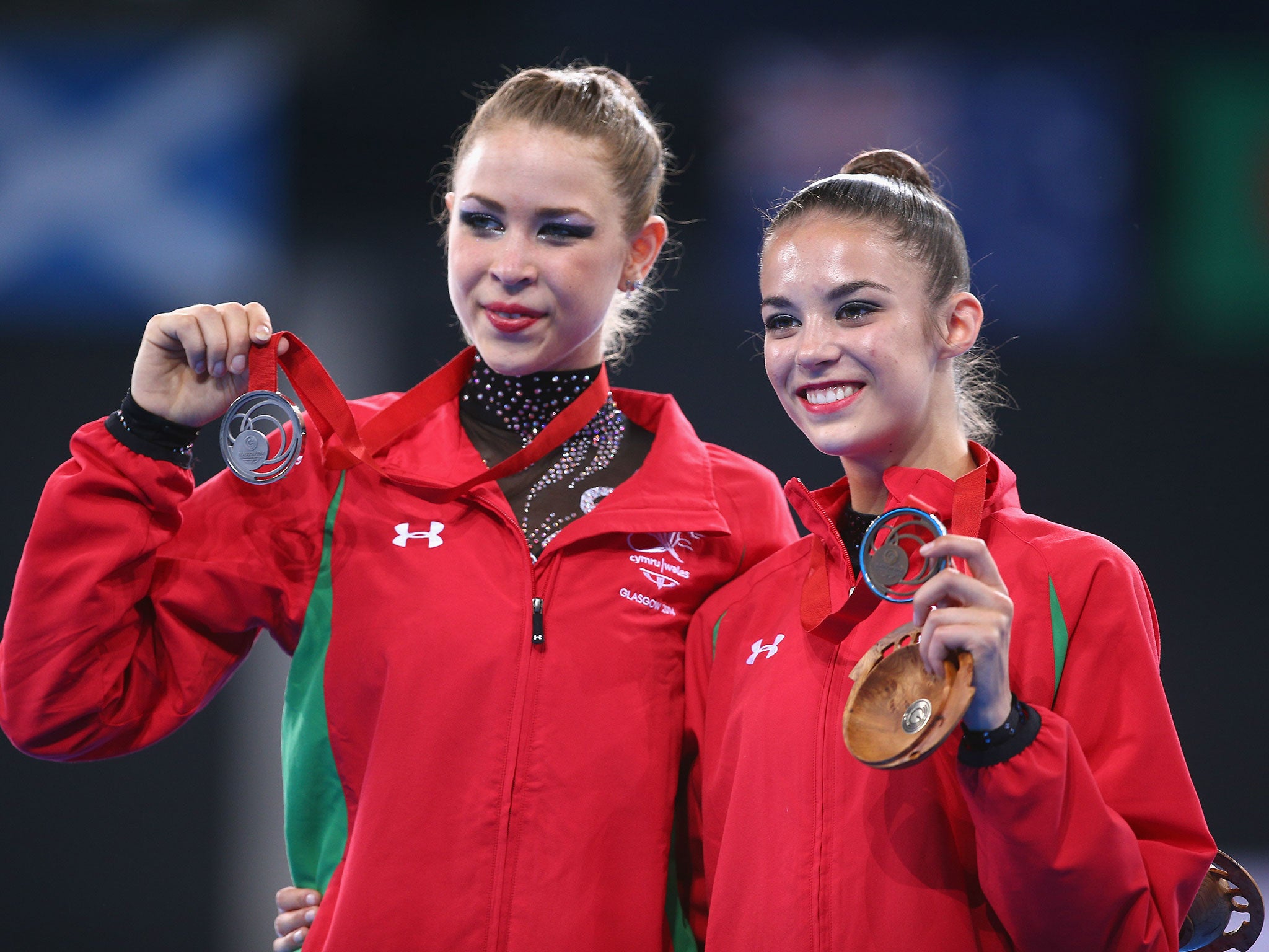 Silver medallist Francesca Jones (L) of Wales embraces bronze medallist Laura Halford (R)