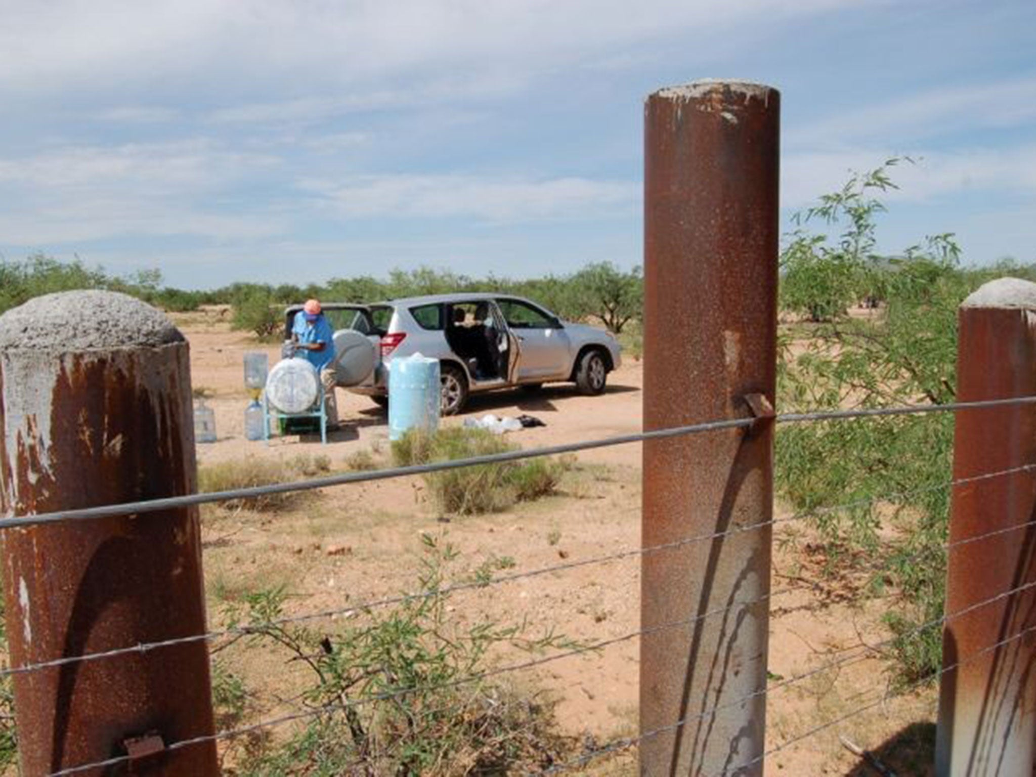 Mike Wilson with his water tank on the Mexican side of the border