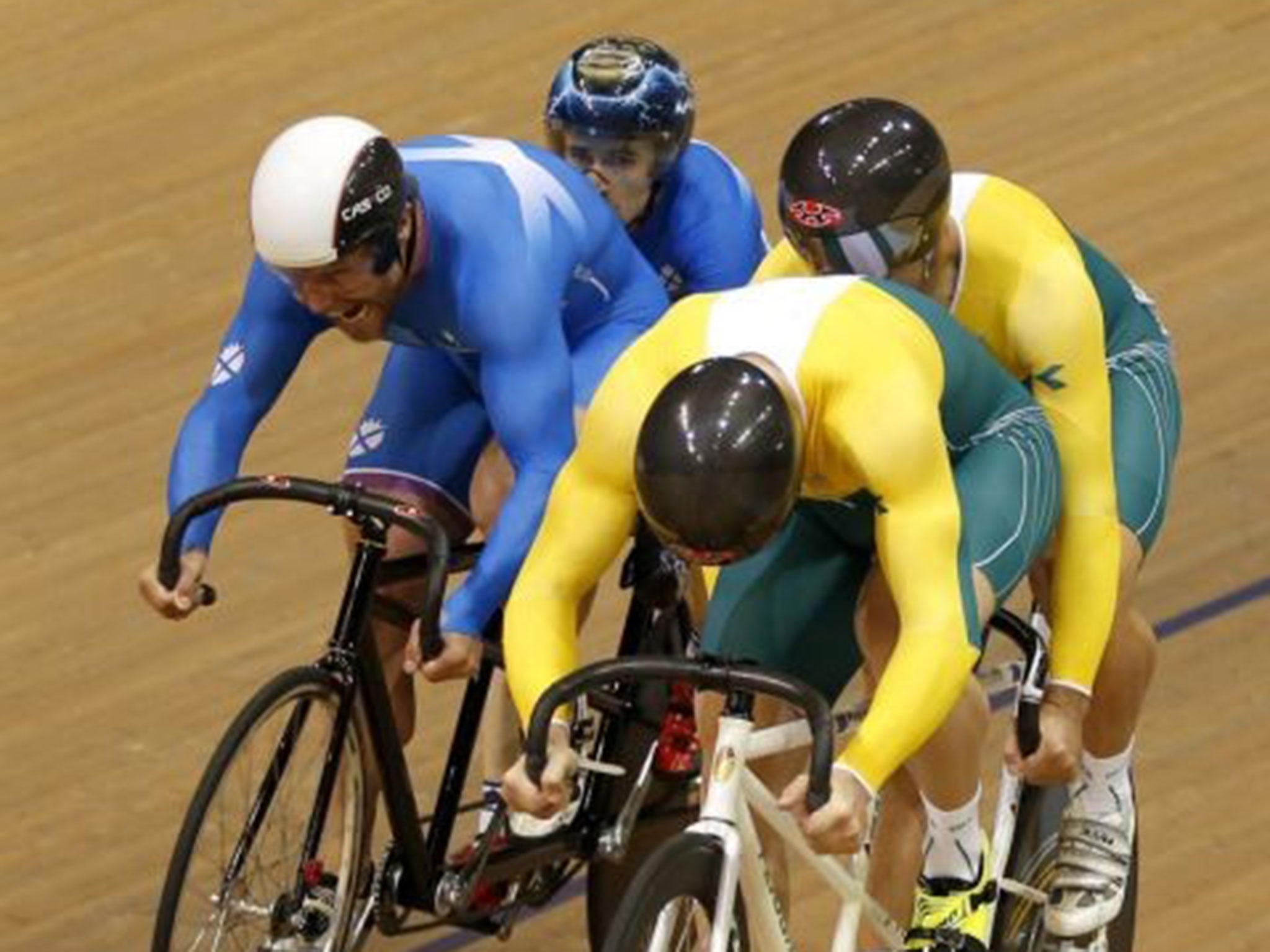 At the races: Scotland’s Neil Fachie and pilot Craig Maclean (in blue) come from behind to beat Australia