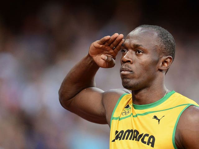 Bolt salutes the Jamaican flag