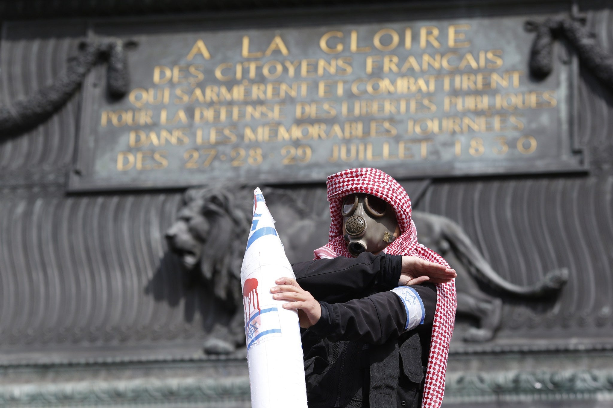 The quenelle gesture, widely seen as anti-Semitic, given in France