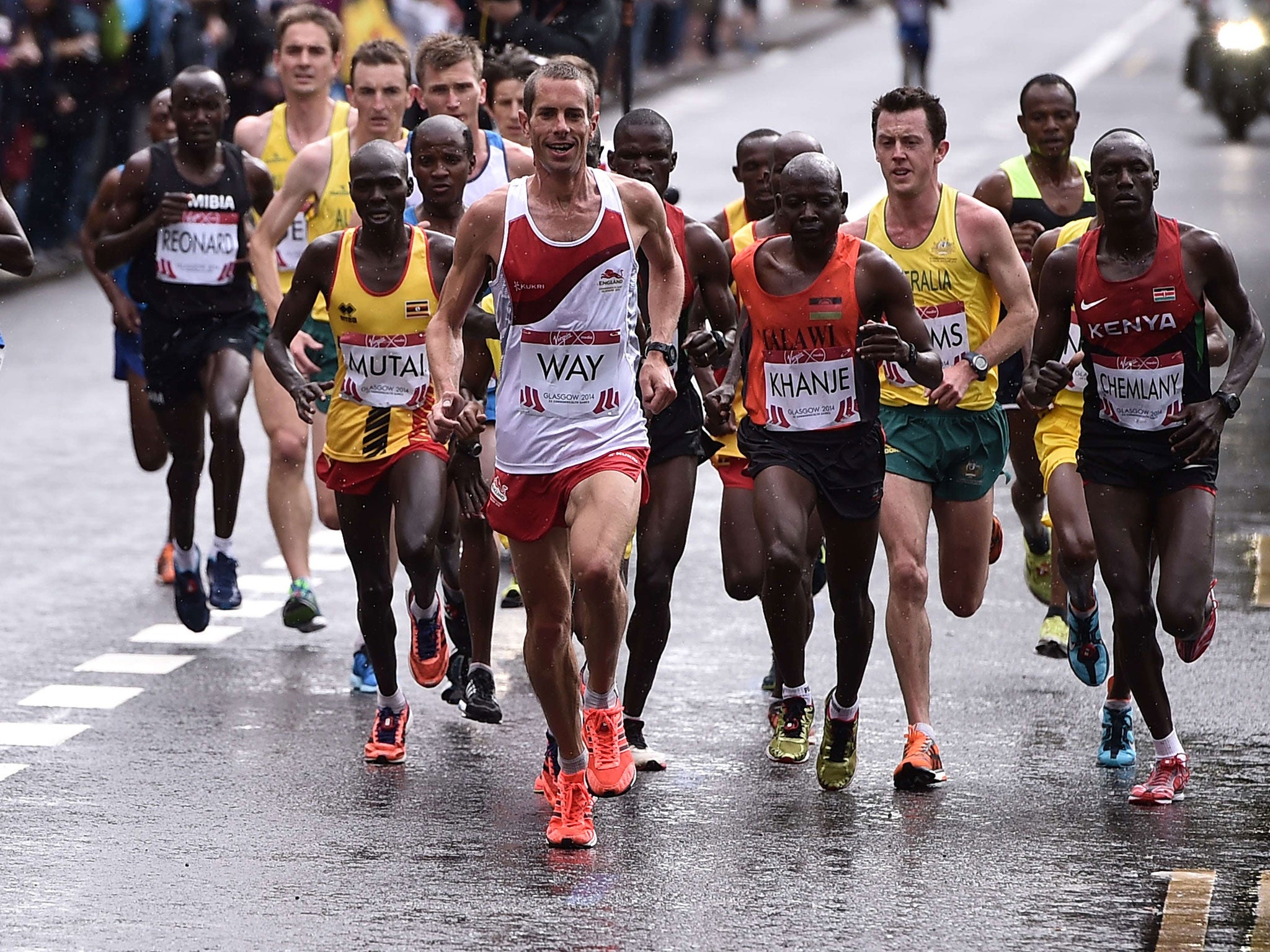 Steve Way leading the marathon, before finishing 10th, the top English runner