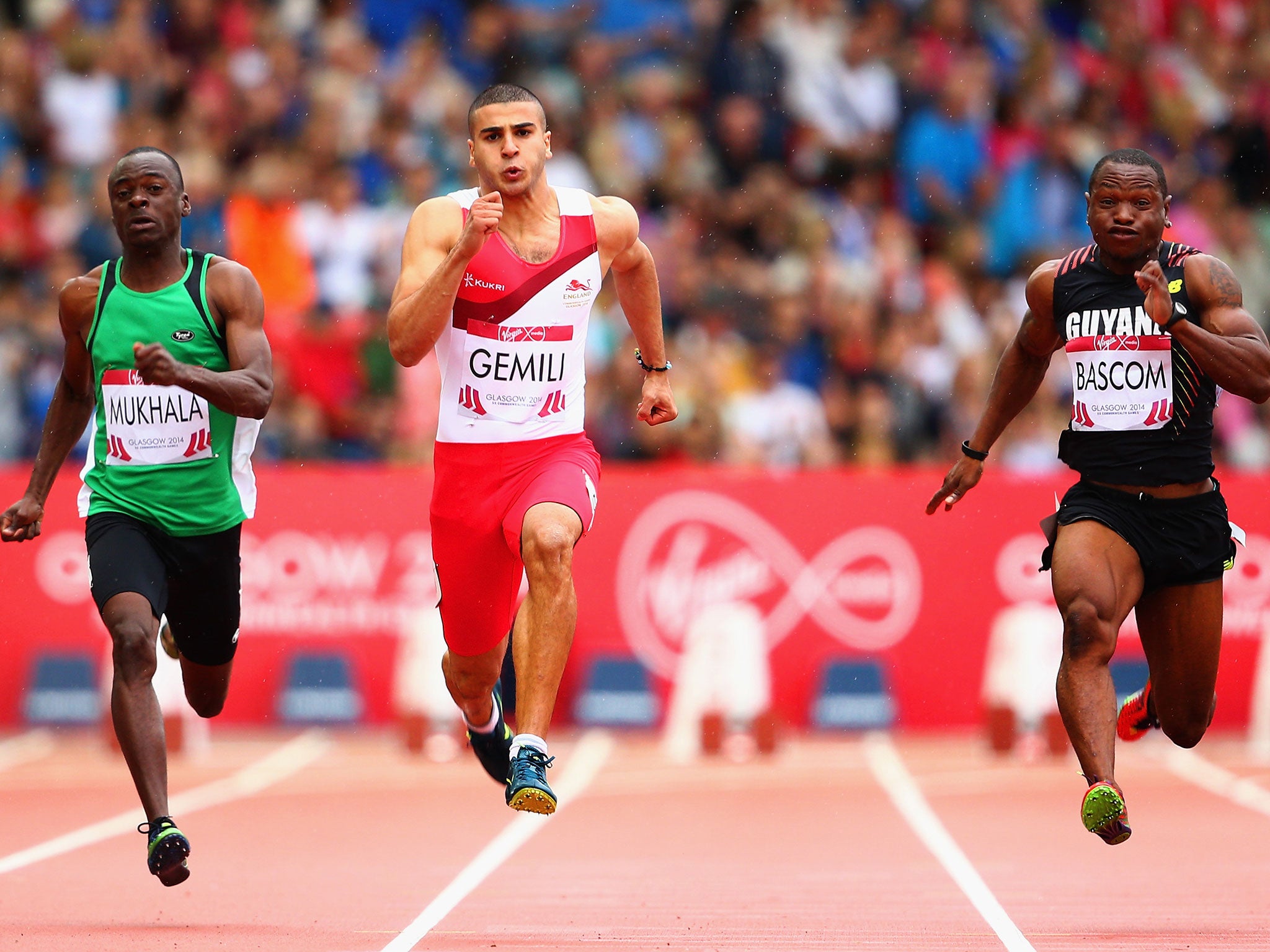 Adam Gemili, centre, on his way to recording the fastest time in the 100m heats in Glasgow